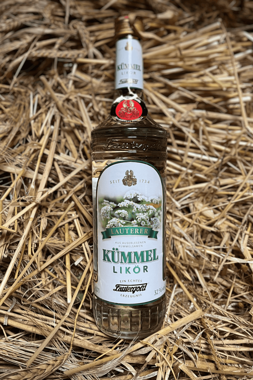 Kümmel - Likör 32% vol. Kümmel im Stroh
